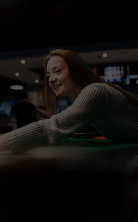 positive-girl-plays-billiards-leisure